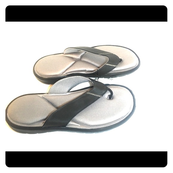 black fabric flip flops